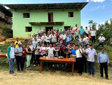Group photo of CENFROCAFE members in front of a building smiling at the camera.