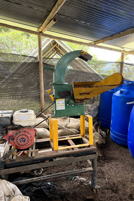 This is a machine that grinds down organic materials to make a material that composts quickly. They are using this for sugar cane and other food waste and as a supplement to their liquid fertilizers.