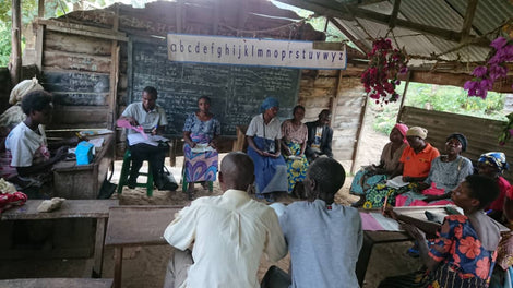 Photo from the Muungano Cooperative of producers in a classroom setting.