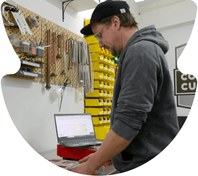 Technician servicing an espresso machine